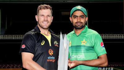 Aaron Finch of Australia and Babar Azam pose with the Australia-Pakistan T20 series trophy at the Sydney Cricket Ground. Getty Images