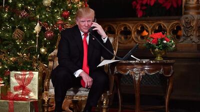 Having solved the Merry Christmas problem, Mr Trump no doubt will turn his mind to solving the problem of the America-wide ban on saying “Happy New Year” and “Happy Birthday”. AFP / Nicholas Kamm
