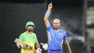 Mirwais Ashraf of Balkh Legends takes the wicket of Ihsanullah of Paktia Panthers in the Afghanistan Premier League match at Sharjah Cricket Stadium. Chris Whiteoak / The National