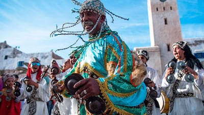 A Gnawa traditional group performs in the city of Essaouira to celebrate the decision to add the Gnawa culture to Unesco's list of Intangible Cultural Heritage of Humanity. AFP