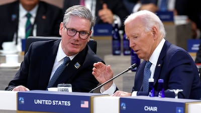 Mr Starmer speaks with Mr Biden. The UK Prime Minister is visiting Washington following a landslide win for his party in the recent elections. Getty Images / AFP