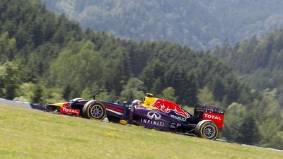 Red Bull Racing F1 driver Daniel Ricciardo steers his car during the Austrian Grand Prix on Sunday. Erwin Cheriau / EPA