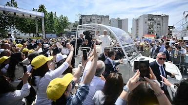 Pope Leo XIV at Piazza Nicola Calipari in Accera, Campania, part of metropolitan Naples, at the end of pastoral visit to the community of the Land of Fires on May 23, 2026. 'Terra dei Fuochi' is an area in the southern Italian region of Campania where toxic waste has been dumped by the Camorra, causing environmental hazards. Acerra and the surrounding territory have higher-than-average cancer rates, linked to the dumping, burning, and burying of toxic waste. AFP