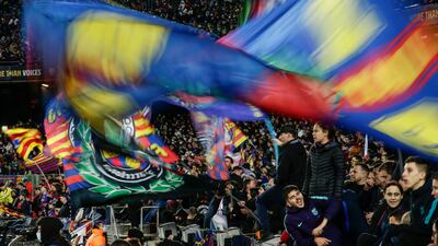 Barcelona supporters celebrate after Pedri scored the opening goal against Sevilla. AP