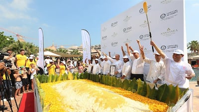 Forty-six chefs worked through the night to produce the world’s largest batch of Thai sticky rice with mango in Dubai. Satish Kumar / The National