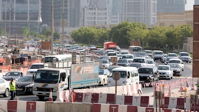 Security guards from the Jumeirah Lakes Towers community were deployed at key traffic points a day after motorists were forced to leave the area as traffic ground to a halt. Jeffrey E Biteng / The National