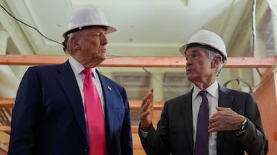 Donald Trump with Jerome Powell during a tour of the Federal Reserve Board building in July last year. Reuters
