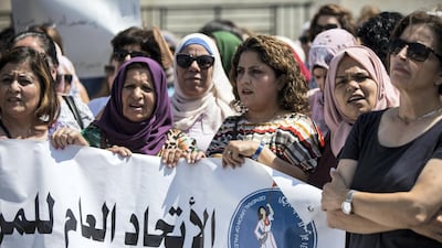 Palestinian women protest in front of the prime minister's office in Ramallah on September 2, 2019 to demand an investigation into the death of Israa Ghrayeb. Heidi Levine for The National