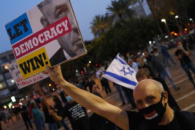 Israelis protest against Prime Minister Benjamin Netanyahu in Tel Aviv on April 19, 2020. AFP