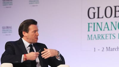 CNBC business anchor Geoff Cutmore moderates a panel on the second day of Global Financial Markets Forum. Ravindranath K / The National