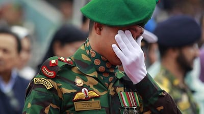 An emotional moment for a Bangladeshi soldier as people pay their respects to the victims of the attack on Holey Artisan Bakery, in Dhaka, Bangladesh. AP Photo
