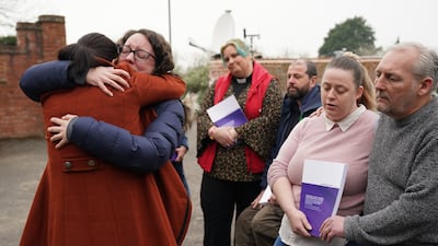 Rhiannon Davies, left, embraces Kayleigh Griffiths, following the release on Wednesday of the final report by Donna Ockenden, chairwoman of the Independent Review into Maternity Services at the Shrewsbury and Telford Hospital NHS Trust, in Shropshire. The inquiry found that hundreds of newborn deaths at Shrewsbury hospital were avoidable. PA