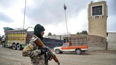 A member of the Taliban security forces stands guard at the Afghanistan-Pakistan border in Spin Boldak. AFP