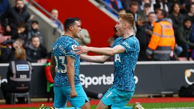 Pedro Porro celebrates with Dejan Kulusevski after scoring the opener for Tottenham. Getty