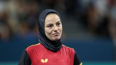 Dina Meshref of Egypt reacts after her 4-0 defeat. Reuters