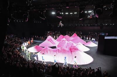 A motocross rider does a trick over the runway at the Fenty Puma by Rihanna Spring/Summer 2018 Collection Dimitrios Kambouris / Getty Images for FENTY PUMA By Rihanna