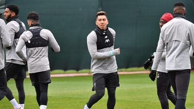 Liverpool's Roberto Firmino, centre. AFP