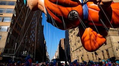 The Goku balloon make its way down Central Park West. AP Photo