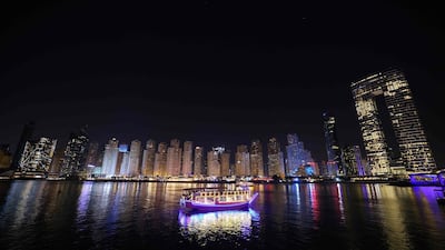 TOPSHOT - A picture taken on January 13, 2021 shows a view of Jumeirah Beach Residence, with Jumeirah Gate on the right, in Dubai. AFP