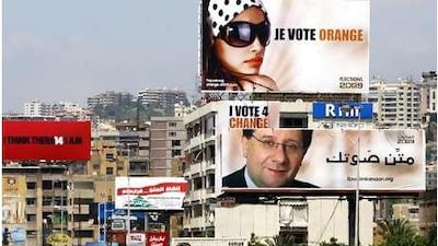 Billboards clutter the roads in Beirut.