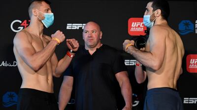 David Zawada of Germany and Ramazan Emeev of Russia face off during the UFC weigh-in at Etihad Arena on UFC Fight Island. Jeff Bottari / Zuffa LLC / Getty Images / UFC