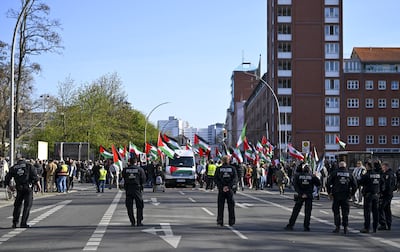 Hundreds of people carrying Palestinian flags gather in Kreuzberg, Berlin for a peaceful demonstration amid tight security. Anadolu via Getty Images