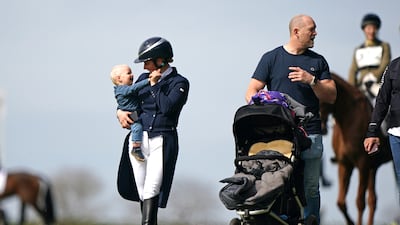 Zara and Mike Tindall with their son Lucas. PA