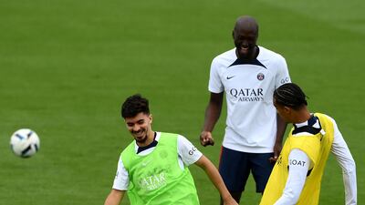 Midfielder Vitinha and forward Hugo Ekitike train for the match against Monaco. AFP