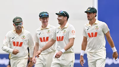 Left to right: Australia bowlers, Nathan Lyon, Brendan Doggett, Scott Boland and Mitchell Starc celebrate after bowing out England for 164. AFP