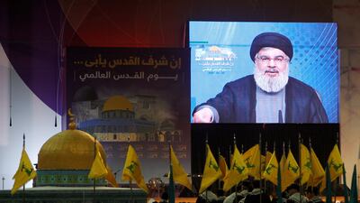 Hizbollah leader Hassan Nasrallah addresses his supporters via a video link during a rally in Beirut's southern suburbs on June 23, 2017. The Lebanese Shiite group faces further US sanctions through three bills set to be introduced in Congress in July 2017. Reuters
