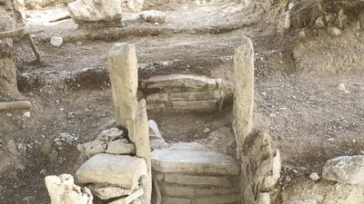 The entrance to a tomb in an ancient burial site that has been uncovered in Dibba, Fujairah. Reem Mohammed / The National