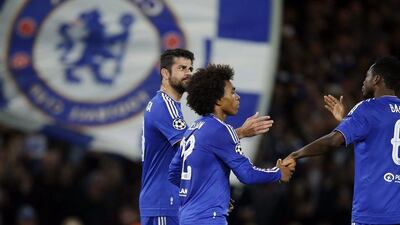Chelsea’s Diego Costa, Willian and Baba Rahman react after Dynamo Kiev’s own goal in their Champions League match on Wednesday night. Andrew Coulridge / Action Images / Reuters
