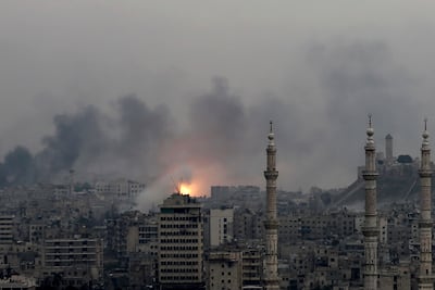 A ball of fire rises after a series of government air strikes on Damascus in the Syran civil war in 2016. AP