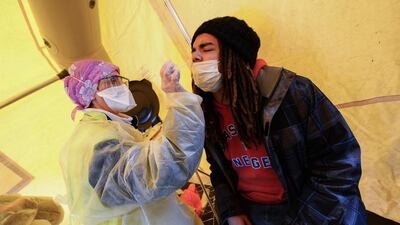 A man undergoes a rapid antigen test for the Covid-19 in Lieuron, France. AFP