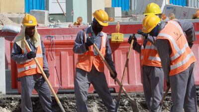 A picture taken on November 16, 2014 shows migrant workers at a construction site in Doha. AFP Photo