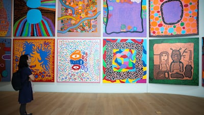 A visitor at the Yayoi Kusama Museum looking at her latest works in Tokyo, Japan. Christopher Jue / EPA