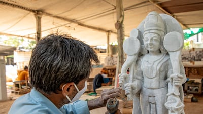 The work depicts Hindu deities and captures life in ancient times. Photo: Baps Hindu Mandir