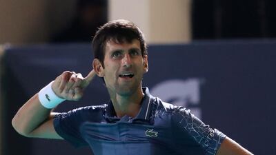 Novak Djokovic celebrates after winning the championship which he also clinched in 2011, 2012 and 2013. Suhaib Salem / Reuters