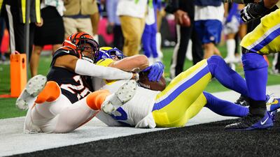 Los Angeles Rams wide receiver Cooper Kupp catches a touchdown pass while being guarded by Cincinnati Bengals cornerback Eli Apple during the second half of Super Bowl LVI at SoFi Stadium. EPA