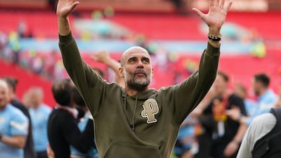 Manchester City manager Pep Guardiola celebrates after winning the FA Cup final at Wembley Stadium on June 3, 2023. PA