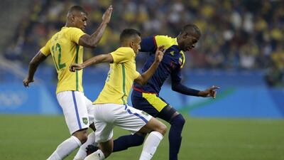 Colombia’s Cristian Borja, right, goes for the ball with Brazil’s Marquinhos, centre, and Walace during a quarter-final match of the men’s Olympic football tournament between Brazil and Colombia in Sao Paulo, Brazil, Saturday August 13, 2016. Leo Correa / AP