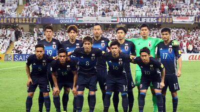 Japan's starting eleven pose for a group picture ahead of their Fifa World Cup 2018 qualifier against UAE aat Hazza Bin Zayed Stadium in Al Ain on March 23, 2017. Nezar Balout / AFP
