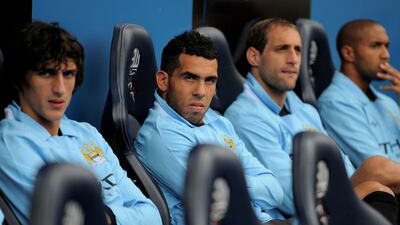 After a summer of speculation over his future and the arrival of fellow Argentine Sergio Aguero, Tevez found himself on the bench. Michael Regan / Getty Images