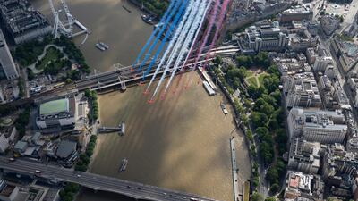 RAF's Red Arrows, flying alongside their French counterparts, La Patrouille de France over the River Thames, as French President Macron visits London. EPA