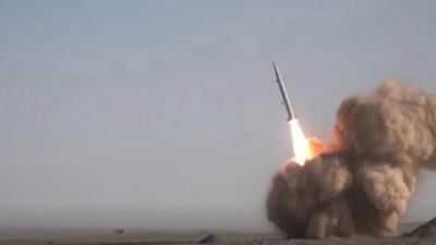 A screen grab from a video made available by Iran's Press TV shows the launch of the new Raad-500 short-range ballistic missile unveiled on the same day as the satellite launch. EPA