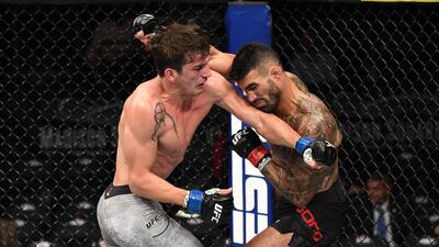 (L-R) Chance Rencountre and Lyman Good exchange punches in their welterweight bout during the UFC 244 event at Madison Square Garden in New York City. Photo by Josh Hedges
