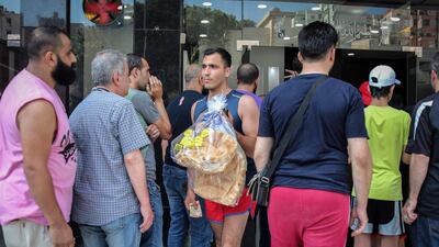 Scenes outside Beirut's bakeries. Hasan Shaaban/Bloomberg