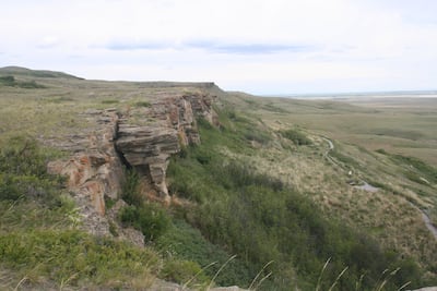 The jump site at Head-Smashed-In Buffalo Jump in Canada commemorates the lives of the indigenous people of Blackfoot culture. Getty Images