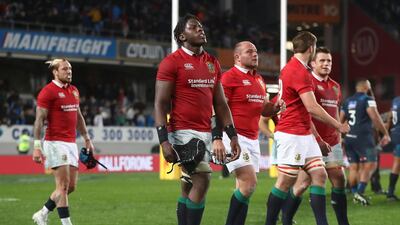 A dejected Maro Itoje of the British & Irish Lions and teammates walk off the pitch following their 22-16 defeat. David Rogers / Getty Images