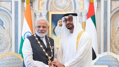 Sheikh Mohamed bin Zayed, Crown Prince of Abu Dhabi, presents the Order of Zayed to Prime Minister Narendra Modi of India. Rashed Al Mansoori / Ministry of Presidential Affairs